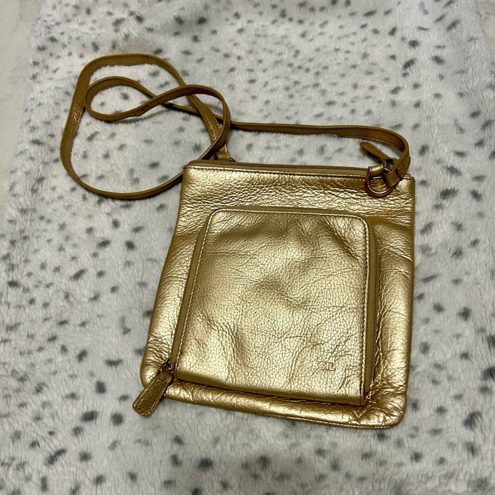 Gold fossil Crossbody bag great for travel 8”H 7.5” H